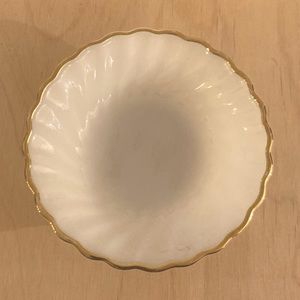 gold-rimmed milk glass dish